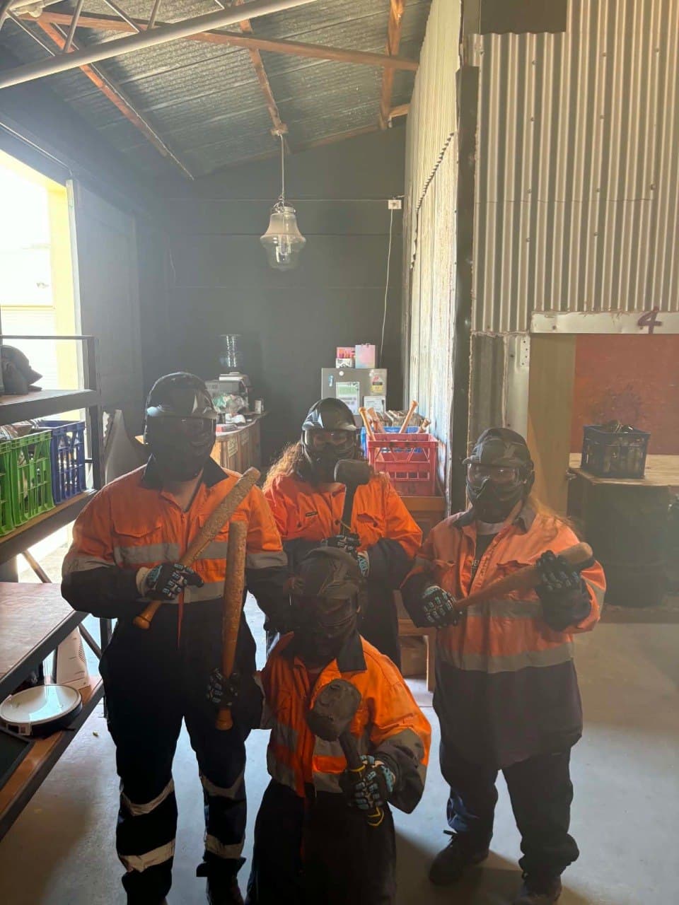 Full safety gear, bats and hammers